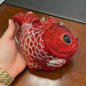 Judith Leiber red fish clutch